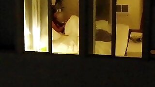 Drone busts girl in bed playing and showing tits